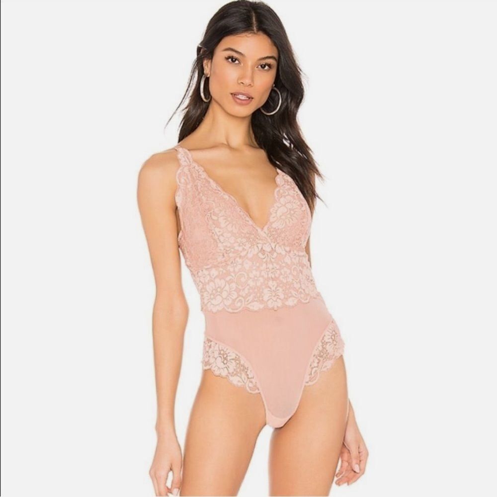 Nwt free people revolve we are hah smarty pants blush pink bodysuit lace top